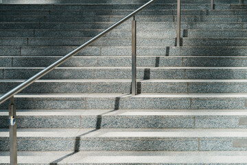 stone staircase and stainless steel railing