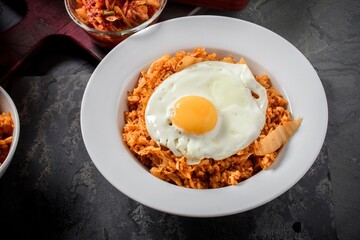 Savory Fusion: Close-Up of Kimchi Fried Rice, a Delectable Blend of Flavors, Captured in 4K Resolution