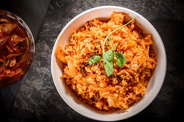 Savory Fusion: Close-Up of Kimchi Fried Rice, a Delectable Blend of Flavors, Captured in 4K Resolution