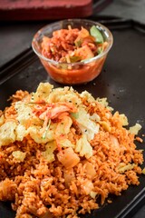Savory Fusion: Close-Up of Kimchi Fried Rice, a Delectable Blend of Flavors, Captured in 4K Resolution