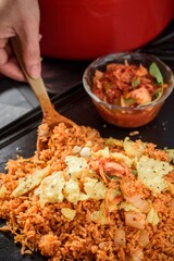 Savory Fusion: Close-Up of Kimchi Fried Rice, a Delectable Blend of Flavors, Captured in 4K Resolution