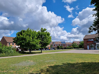 house on the hill at a sunny day with beautiful cloudy sky