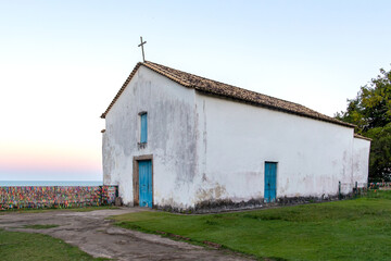 Obraz premium Porto Seguro, Bahia. Church in the historic center of Porto Seguro and the colorful ribbons