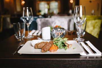 Lamb skewer table setting for dinner