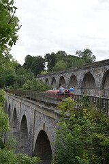 Obraz premium the aqueduct at chirk running parallel to the chirk viaduct