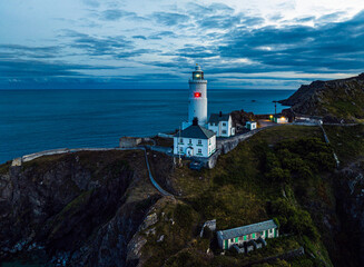 Sunset over Start Point Lighthouse from a drone, Trinity House and South West Coast Path, Devon, England