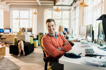 Portrait of a young startup company male office worker