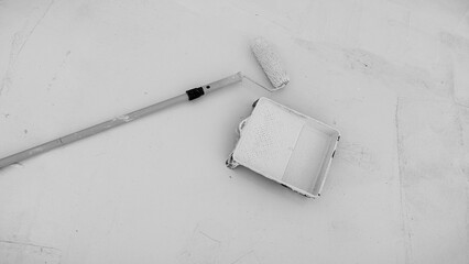 Workers cover the roof with a white thin-film composite material based on epoxy and polyurethane.