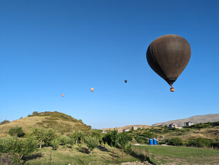 big balloons fly in the mountains of armenia