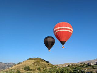 big balloons fly in the mountains of armenia