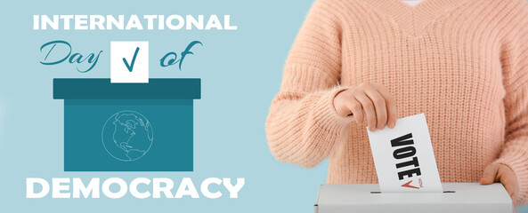 Banner for International Day of Democracy with voting woman