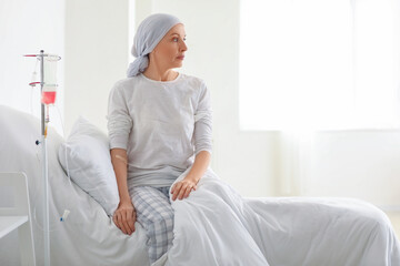 Mature woman after chemotherapy in clinic