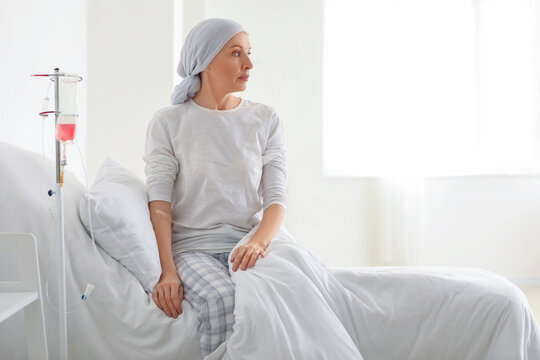 Mature woman after chemotherapy in clinic