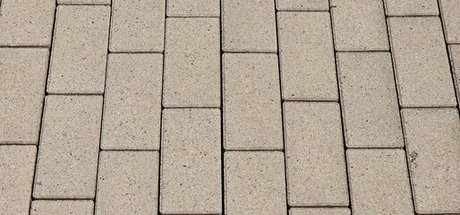 Sidewalk seamless pattern with dumb interlocking textured concrete tiles. Vector pavement texture top view. Outdoor concrete staircase on the sidewalk. Cobblestone footpath or courtyard. block bottom