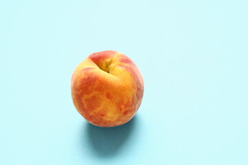 Sweet peach on blue background