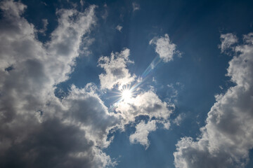 sky replacement blue sky white clouds sun and rays 