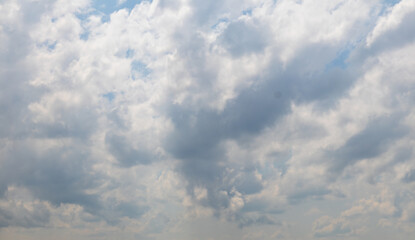 sky replacement of hazy clouds and blue sky in summer
