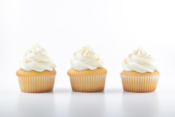 Three cupcakes on a white background.