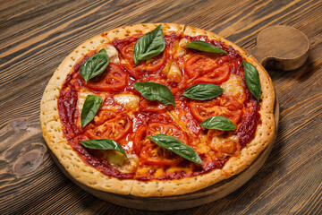 Board with tasty pizza on wooden background