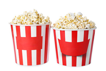 Fototapeta premium Buckets with tasty popcorn on white background