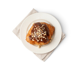 Plate of tasty sweet croissant with chocolate and nuts isolated on white background