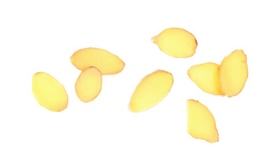 Flying slices of fresh ginger root on white background