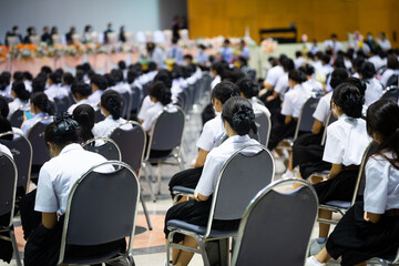 Adult students participating in a seminar in the conference hall