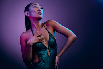 Woman colorful light beauty glamour trendy glowing purple fashion blue neon make-up disco
