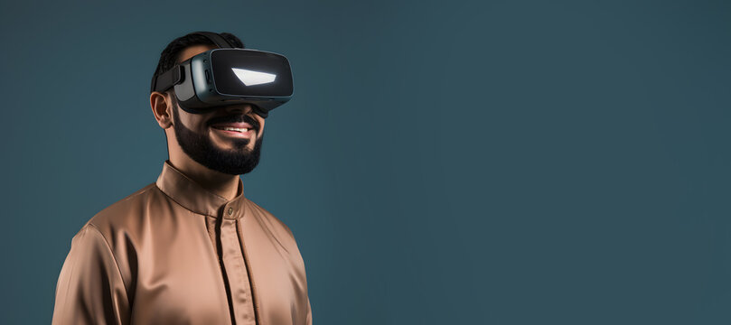 Excited asian man playing on VR headset isolated on dark background with copy space