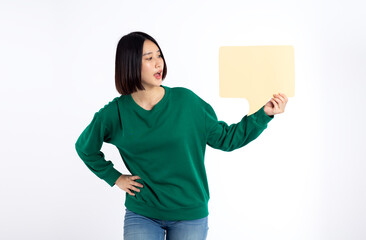 Portrait of asian young woman holding a empty brown speech bubble isolated on white background