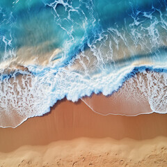 Aerial view of sandy beach from above.