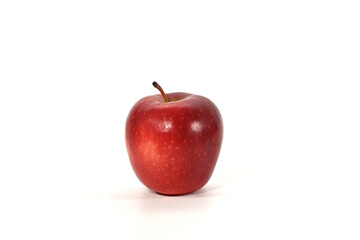 Close-up of a red apple isolated on white background