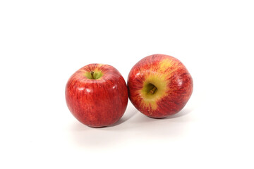 Close-up of red apples isolated on white background