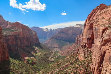 Panoramic aerial view from Zion National Park Canyon Overlook, Utah, USA. Tranquil atmosphere in wilderness. Uninhabited canyon with majestic rock formations and steep cliffs. Mount Carmel highway