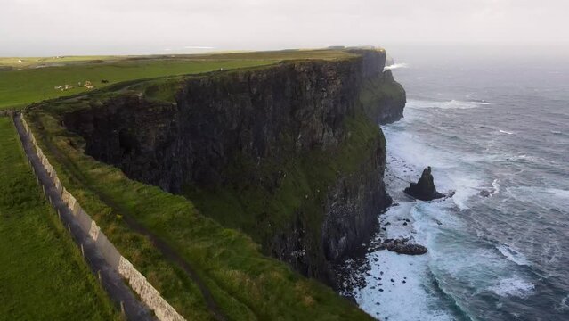Scenic aerial view of Cliffs of Moher at sunrise in Ireland at summer morning