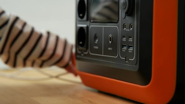 Pressing the home generator power button