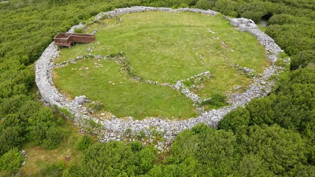 Aerial view of ancient Celtic Stone Ring Fort remaining's in Ireland Co. Clare Burren