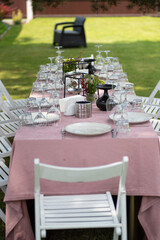 beautiful table setting with flowers and snacks at wedding reception. wedding decorations