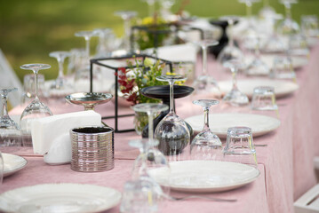 beautiful table setting with flowers and snacks at wedding reception. wedding decorations