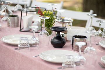 beautiful table setting with flowers and snacks at wedding reception. wedding decorations