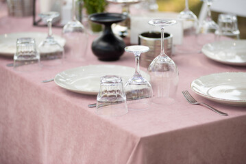 beautiful table setting with flowers and snacks at wedding reception. wedding decorations