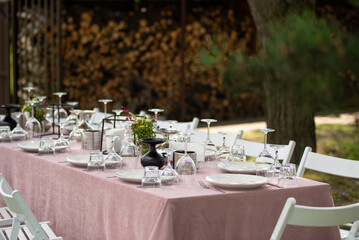 beautiful table setting with flowers and snacks at wedding reception. wedding decorations