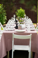 beautiful table setting with flowers and snacks at wedding reception. wedding decorations