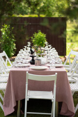 beautiful table setting with flowers and snacks at wedding reception. wedding decorations