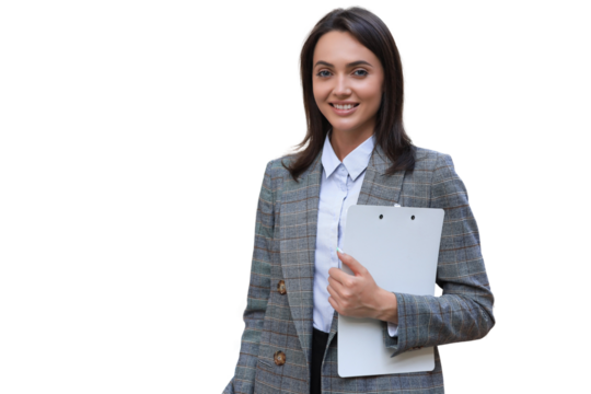 Attractive businesswoman standing near desk in the office.
