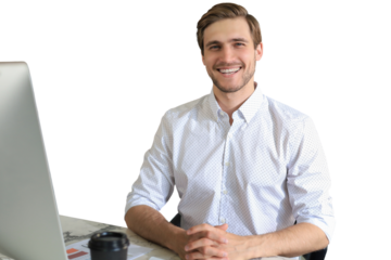 Young modern business man working using computer while sitting in the office.