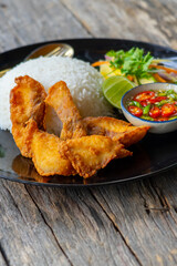 Deep fried red tilapia with papaya salad, Thai traditional food