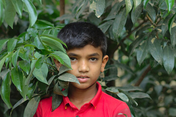 A rohingya refugee boy and a model