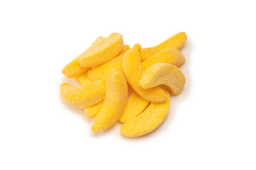 Juicy colorful jelly banana sweets isolated on white.