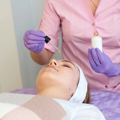 serum cream massage workflow in a beauty salon, close-up